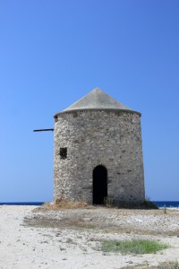 bigstock-Old-windmill-ai-Gyra-beach-Le-36554200